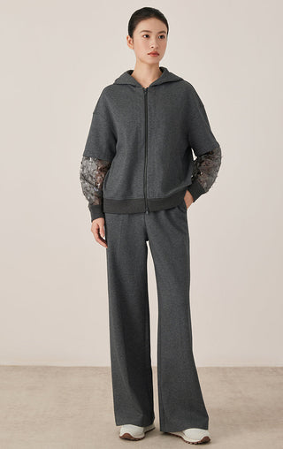 Dark gray zip hooded jacket with short sleeves and sheer patterned mesh sleeve panels