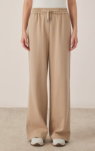 Khaki wide-leg pants with drawstring elastic waistband and relaxed straight legs