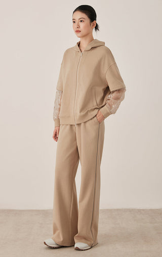Khaki wide-leg drawstring pants with elastic waistband and relaxed fit