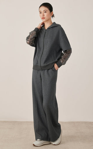 Dark gray wide-leg pants with elastic waist and drawstring, relaxed cuffed hem