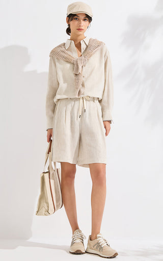Beige linen point-collar button-up shirt with long sleeves and front buttons
