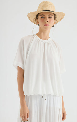 White chiffon blouse front view with gathered neckline and light, flowy short sleeves