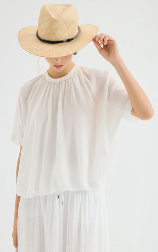 White chiffon blouse, front view with gathered crew neckline and loose short-sleeve shape