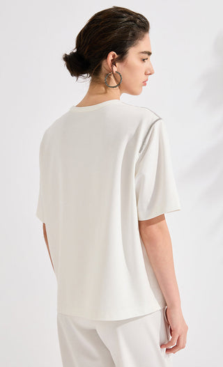 White short-sleeve T-shirt, back view with silver beaded chain trim details