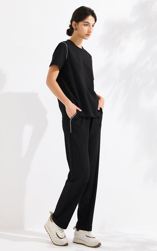 Black wide-leg pants with elastic waist, drawstring, and front patch pockets