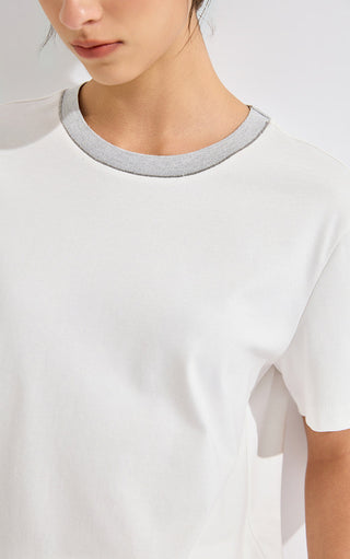 White cotton T-shirt neckline close-up with gray crew rib trim