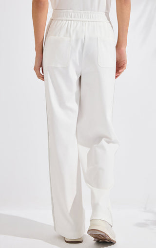 White wide-leg cotton pants with elastic waist and two front pockets