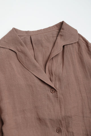 Brown linen shirt collar with button placket neckline detail