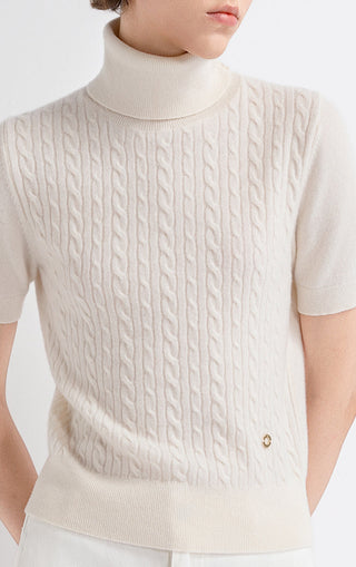 Cream cashmere cable-knit short-sleeve turtleneck sweater with side button detail