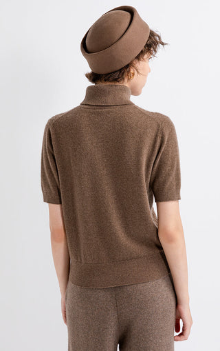 Brown cashmere cable-knit short-sleeve turtleneck sweater, back view with ribbed hem
