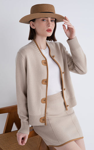Camel cardigan with contrast trim edging, button front, ribbed hem and sleeve cuffs