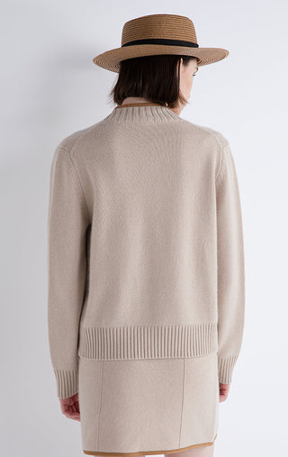 Camel knit cardigan back view with ribbed cuffs and hem, contrast trim at edges