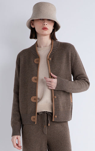 Dark camel wool-and-cashmere knit cardigan with contrast trim and round button placket