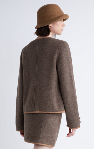Dark brown jacket back view with contrast hem band and center back seam