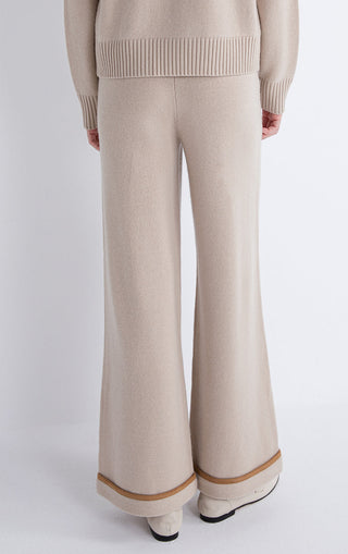 Camel knit flare-leg pants with rib-knit waistband cuff and contrast trim at hem