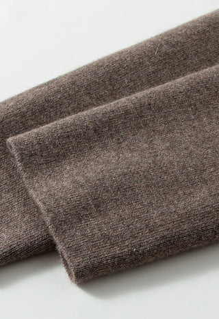 Brown wool-cashmere sleeve and cuff close-up with ribbed knit hem