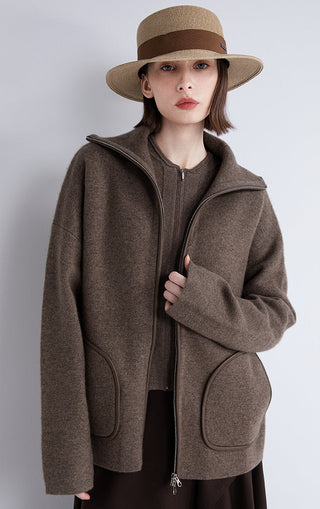 Dark brown wool-cashmere zip jacket with sheepskin-trim edges and center zip front