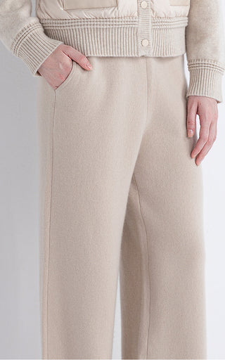 Camel knit pants with buttoned front placket and ribbed waistband detail
