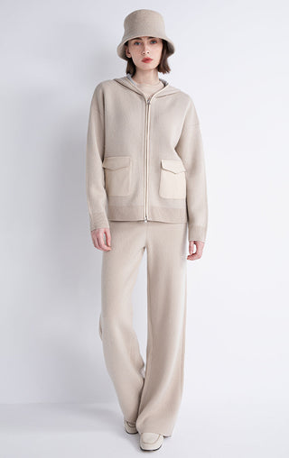 Camel knit pants with wide leg silhouette and ribbed waistband on model