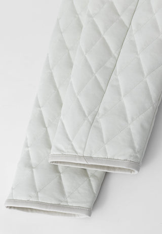 Light greige quilted down jacket sleeve with diamond pattern and cuff hem