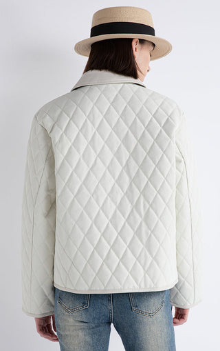 White quilted down jacket back view with stand collar and diamond stitching.