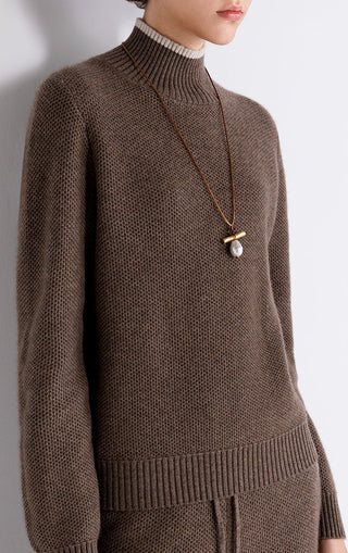 Brown wool-cashmere contrast mock-neck knit sweater detail with textured knit and ribbing