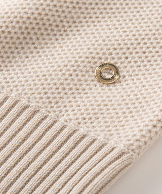 Camel knit sweater with ribbed striped cuff and round button detail