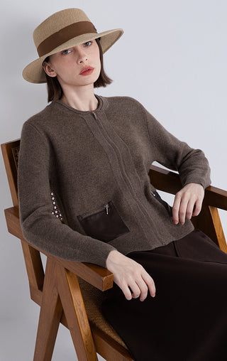 Dark camel zip cardigan showing front and pocket lining with metal zipper tabs