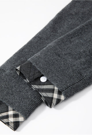Grey cardigan sleeve cuff with plaid lining and button detail
