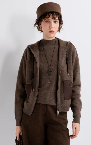Brown wool-cashmere hooded jacket with front zip, drawcord, and brown leather pocket panels