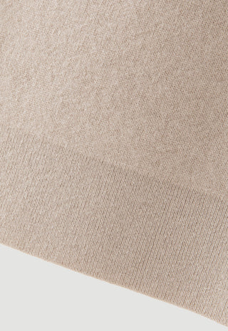 Camel wool-cashmere knit fabric close-up with fine textured weave