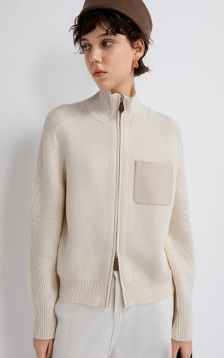 Ivory zip-up knit cardigan with stand collar and front leather patch pocket