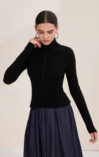 Black fitted cashmere turtleneck sweater with shimmering bead chain front