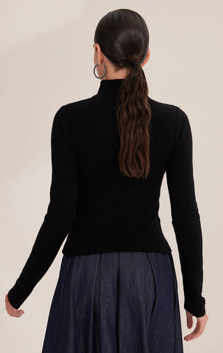 Black cashmere turtleneck sweater, back view with shimmering bead chain center