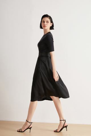 Black wool-silk short-sleeve midi dress with beaded waist detail and flowing skirt