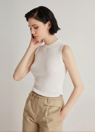 White sleeveless tank top with ribbed crew neckline and fitted knit look